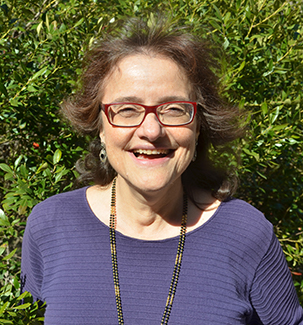 Image of Rosanne DiStefano in front of bushes