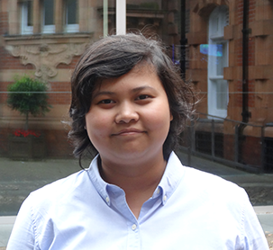 Image of Affelia Wibisono in a courtyard