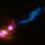Black Hole Fires at Neighboring Galaxy